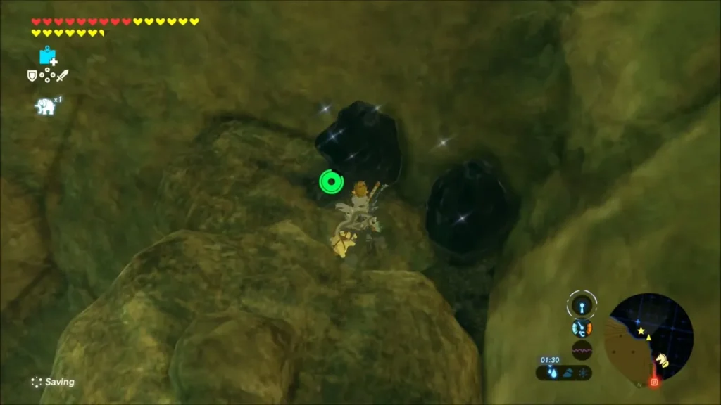 Link perched on rock below two dark cracked boulders Link perched on rock below two dark cracked boulders