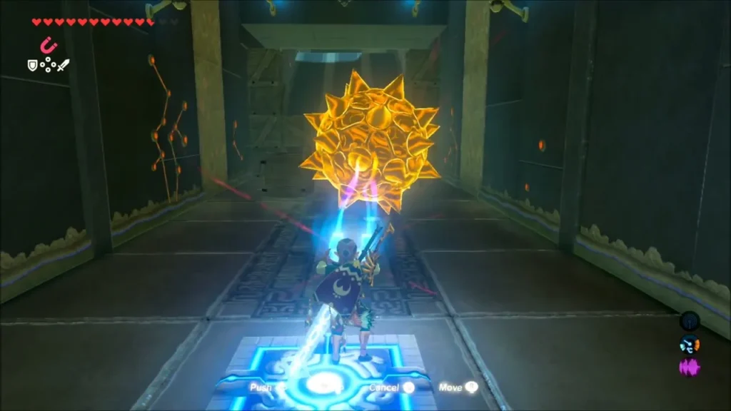 Link on a switch as a golden spiked ball is held by Magnesis in a corridor Link on a switch as a golden spiked ball is held by Magnesis in a corridor
