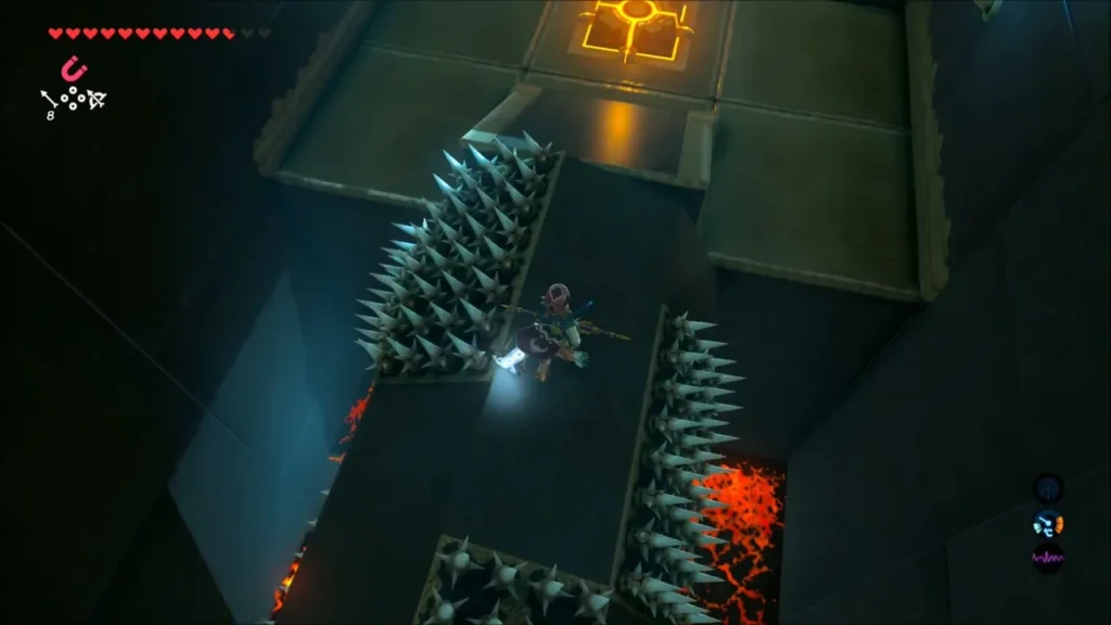 Link on a narrow path between spike walls and lava in Maka Rah Shrine Link on a narrow path between spike walls and lava in Maka Rah Shrine