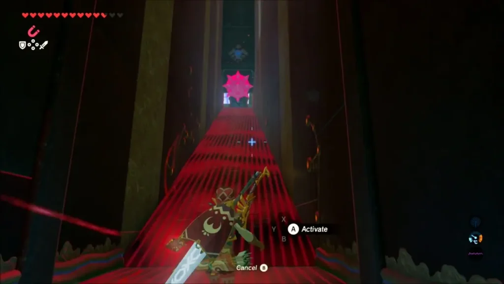 Link aiming Stasis at a spike ball at the end of a corridor in Maka Rah Shrine Link aiming Stasis at a spike ball at the end of a corridor in Maka Rah Shrine