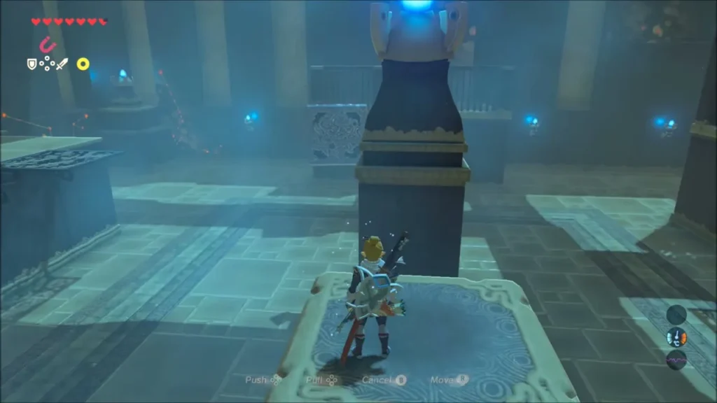 Link on a floor plate in front of a dark pillar inside Mezza Lo Shrine Link on a floor plate in front of a dark pillar inside Mezza Lo Shrine