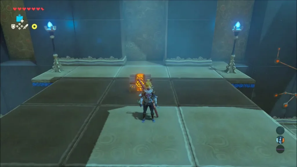 Link standing before a small glowing block set on the floor in Mezza Lo Shrine Link standing before a small glowing block set on the floor in Mezza Lo Shrine
