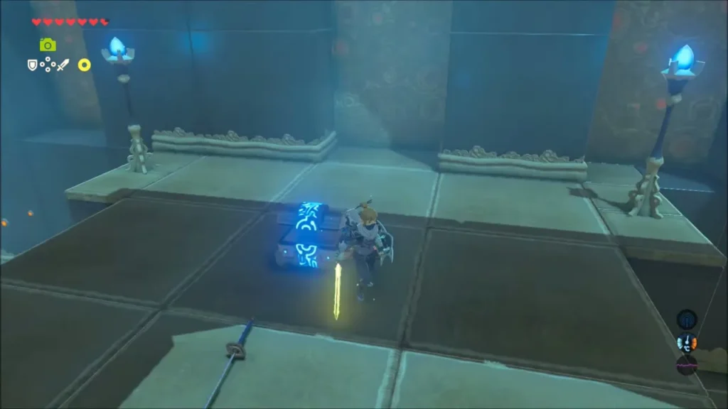 Link opening the chest on the platform and a weapon appearing Link opening the chest on the platform and a weapon appearing
