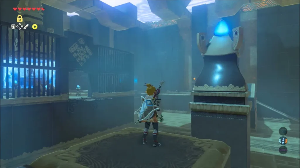 Link standing on a pillar beside the glowing orb pedestal Link standing on a pillar beside the glowing orb pedestal