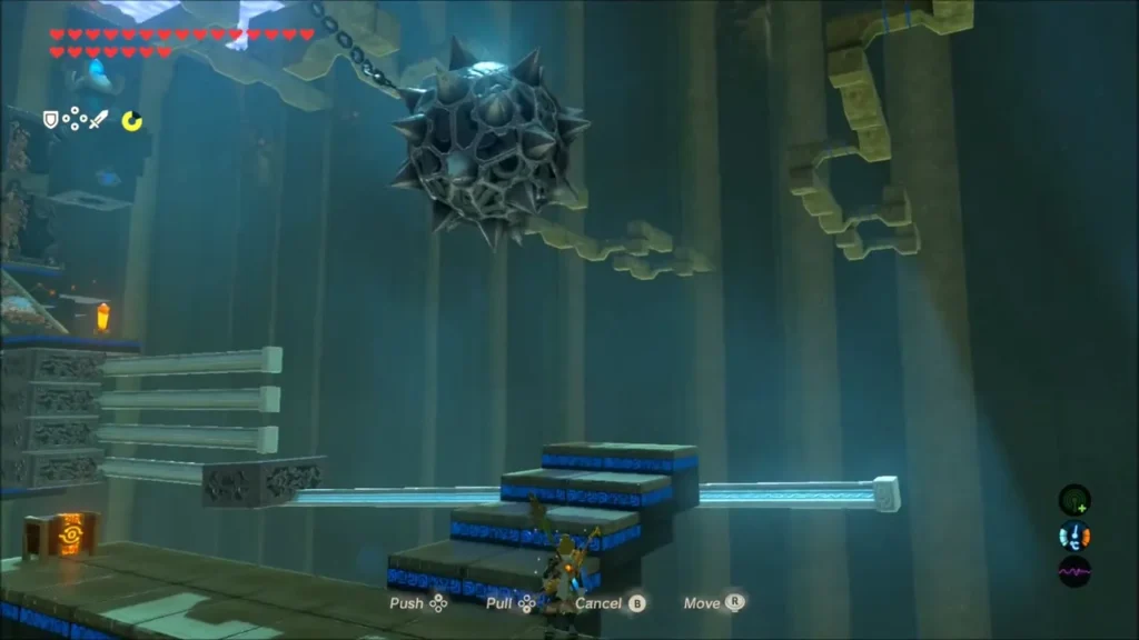 A spiked ball swinging above stairs and metal rails A spiked ball swinging above stairs and metal rails