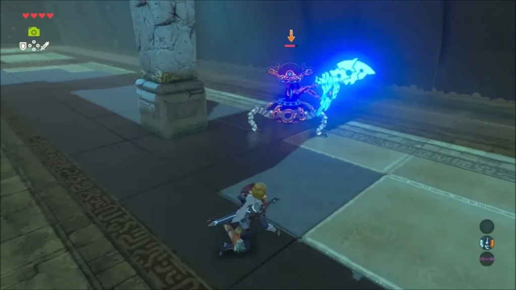 The Guardian Scout sweeping its blue axe across the room while Link keeps low The Guardian Scout sweeping its blue axe across the room while Link keeps low