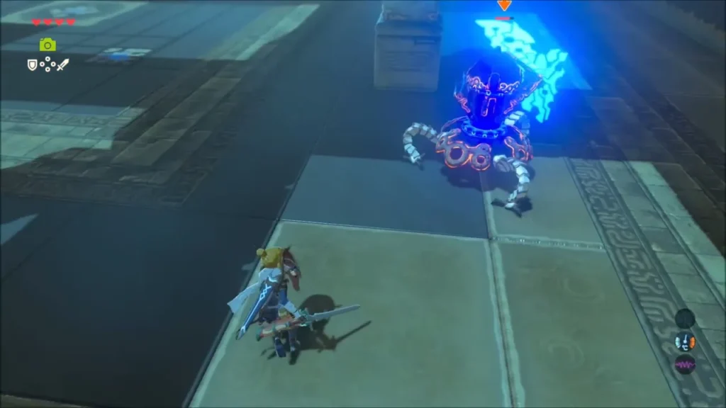 Link backing away from the Guardian Scout with sword drawn Link backing away from the Guardian Scout with sword drawn