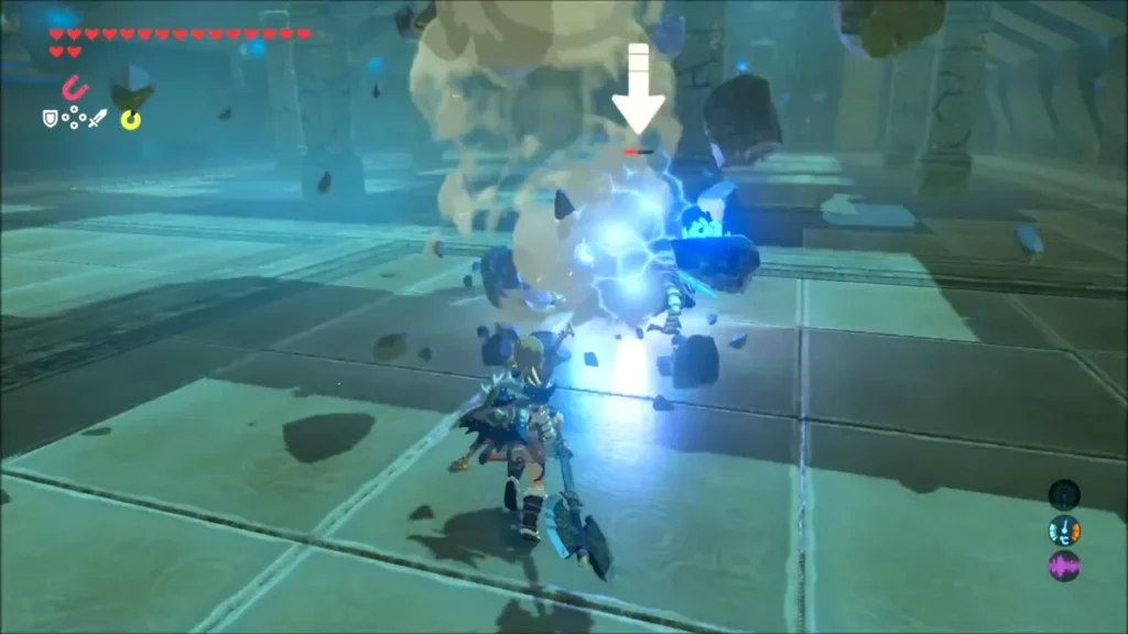 Link smashing the Guardian Scout with an axe, rubble flying Link smashing the Guardian Scout with an axe, rubble flying
