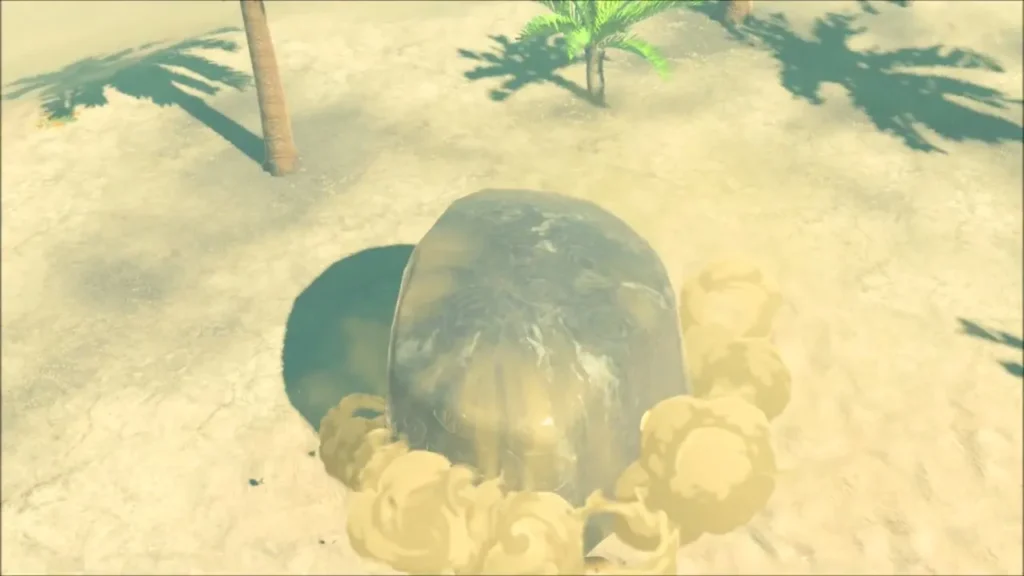 The shrine pushing up out of the sand in clouds of dust The shrine pushing up out of the sand in clouds of dust
