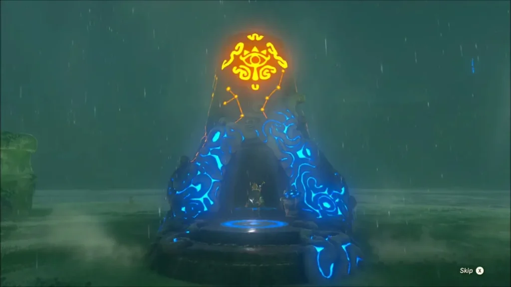 The shrine glowing blue and rising out of the ground with the Sheikah eye on top
