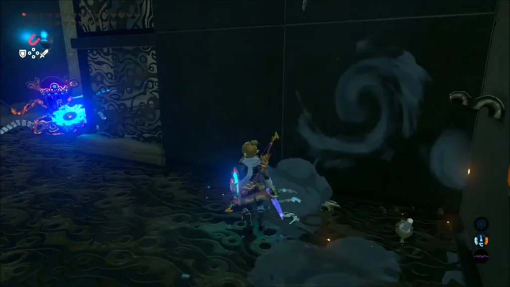 Link beside a small Guardian after its blast in a dark chamber Link beside a small Guardian after its blast in a dark chamber