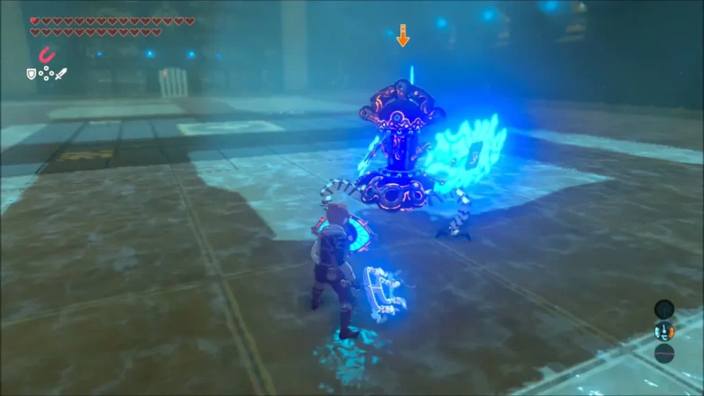 Link with shield up facing a small Guardian in the combat trial room Link with shield up facing a small Guardian in the combat trial room