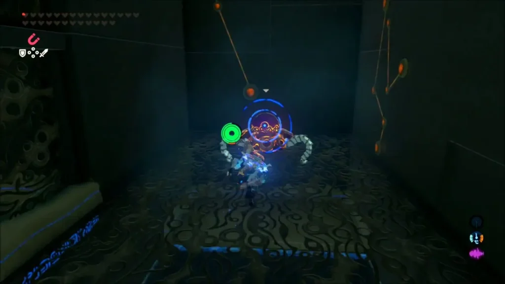 Link locked onto a Guardian Scout in a dark Ruvo Korbah Shrine hall Link locked onto a Guardian Scout in a dark Ruvo Korbah Shrine hall
