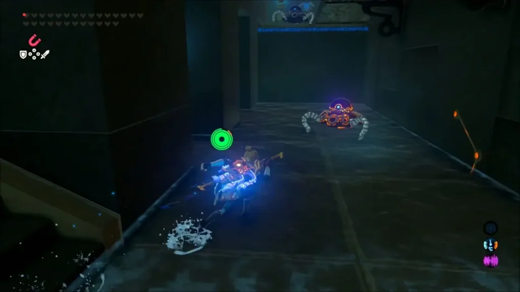Link facing a small Guardian in a dark corridor Link facing a small Guardian in a dark corridor