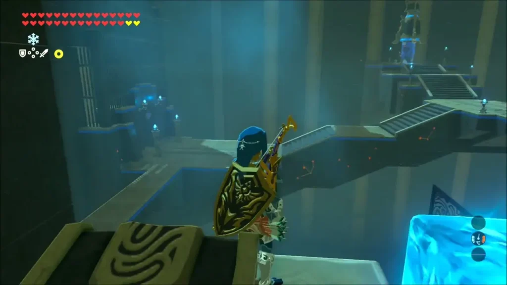Link looking across the shrine from the ledge near the receptacle Link looking across the shrine from the ledge near the receptacle