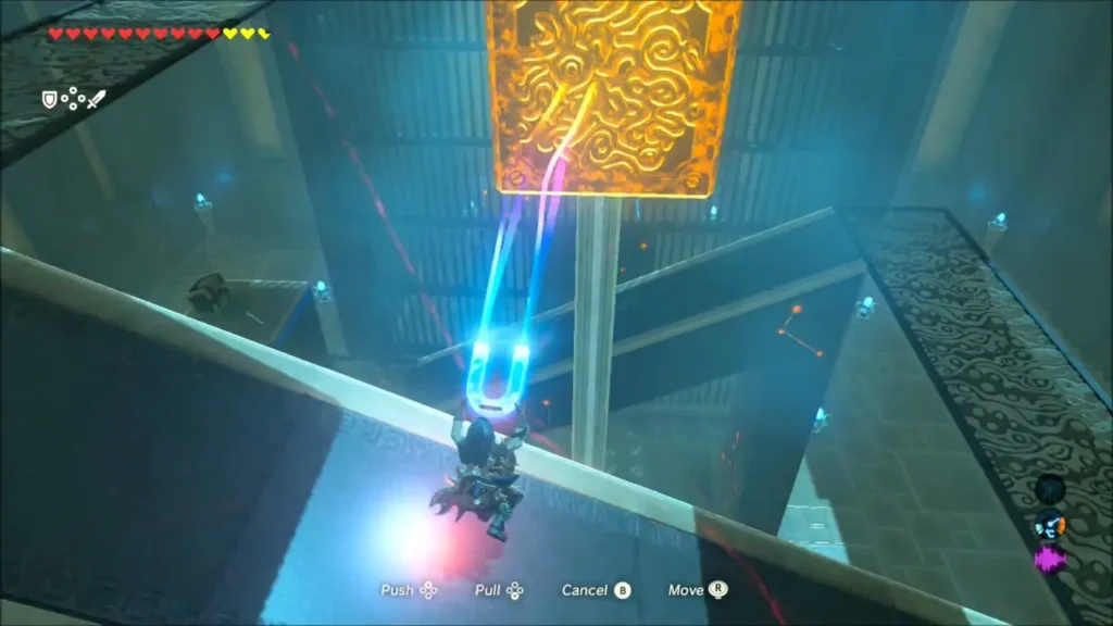 Link using Magnesis to lift the metal cube high above the platforms Link using Magnesis to lift the metal cube high above the platforms