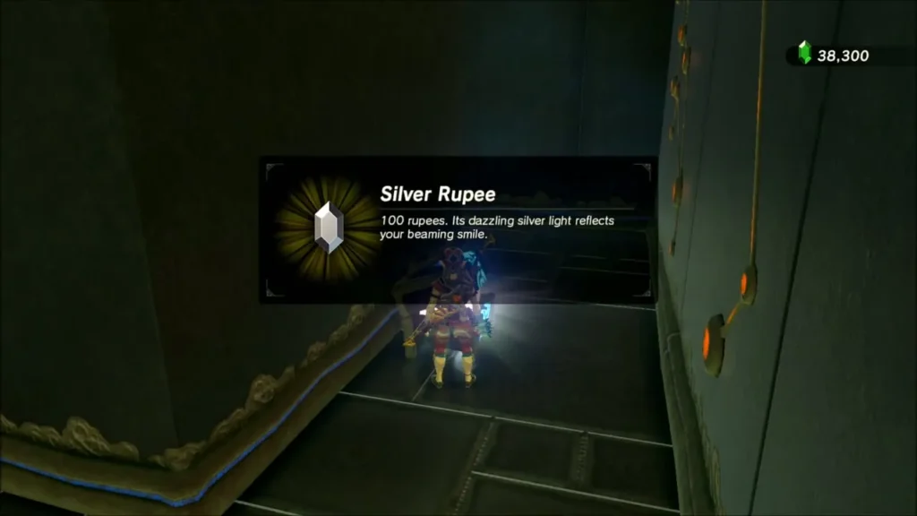 Link receiving a Silver Rupee from the chest behind the column Link receiving a Silver Rupee from the chest behind the column