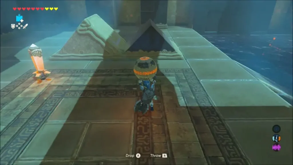 Link carrying a metal ball past a lantern switch beside the water Link carrying a metal ball past a lantern switch beside the water