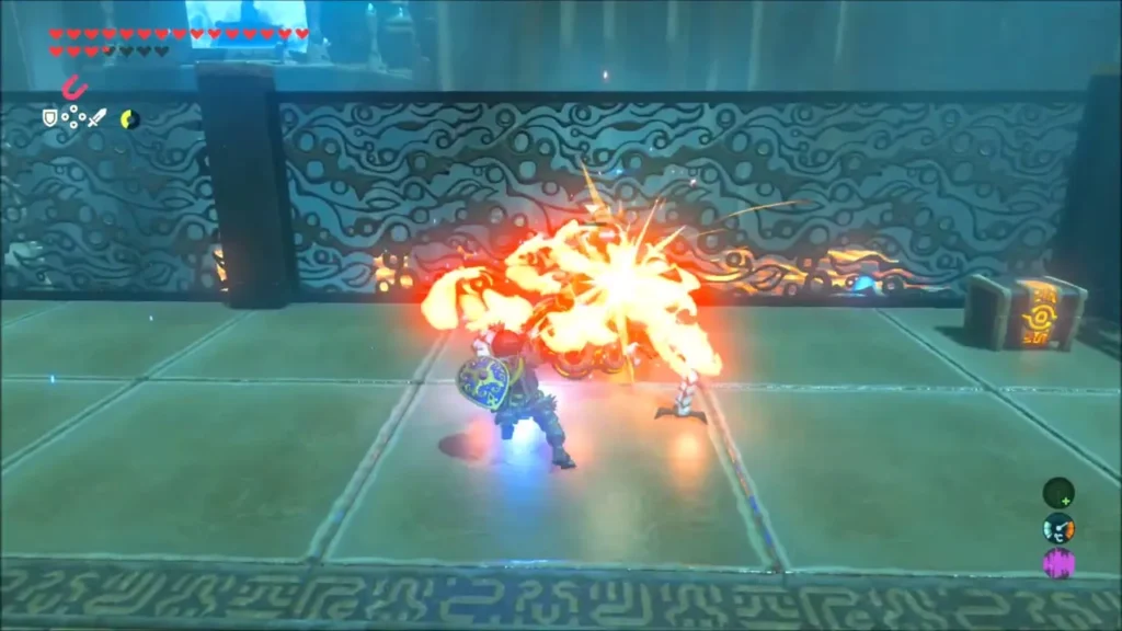 Link fighting a Guardian Scout in a burst of fire near a chest Link fighting a Guardian Scout in a burst of fire near a chest