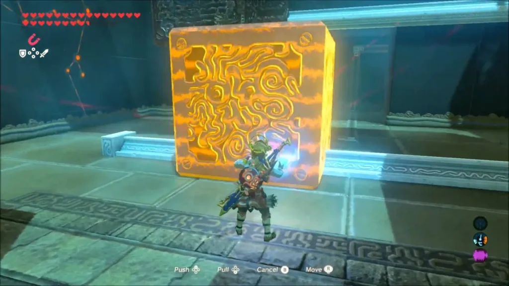 Link holding a block with Magnesis inside Takama Shiri Shrine Link holding a block with Magnesis inside Takama Shiri Shrine