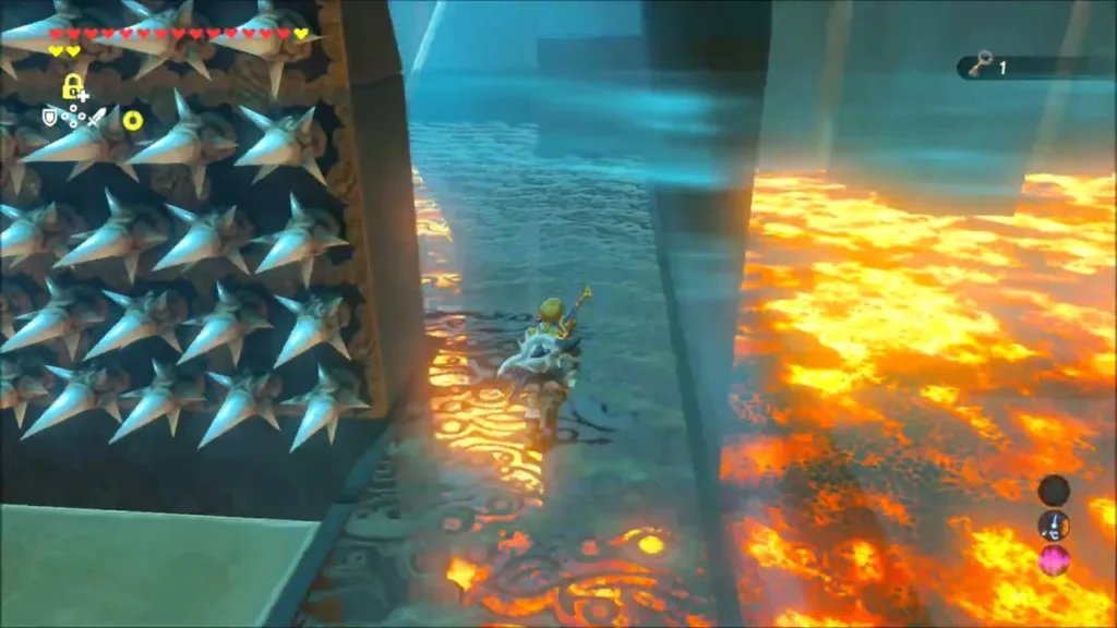 Link beside a wall of spikes at the far corner of the room