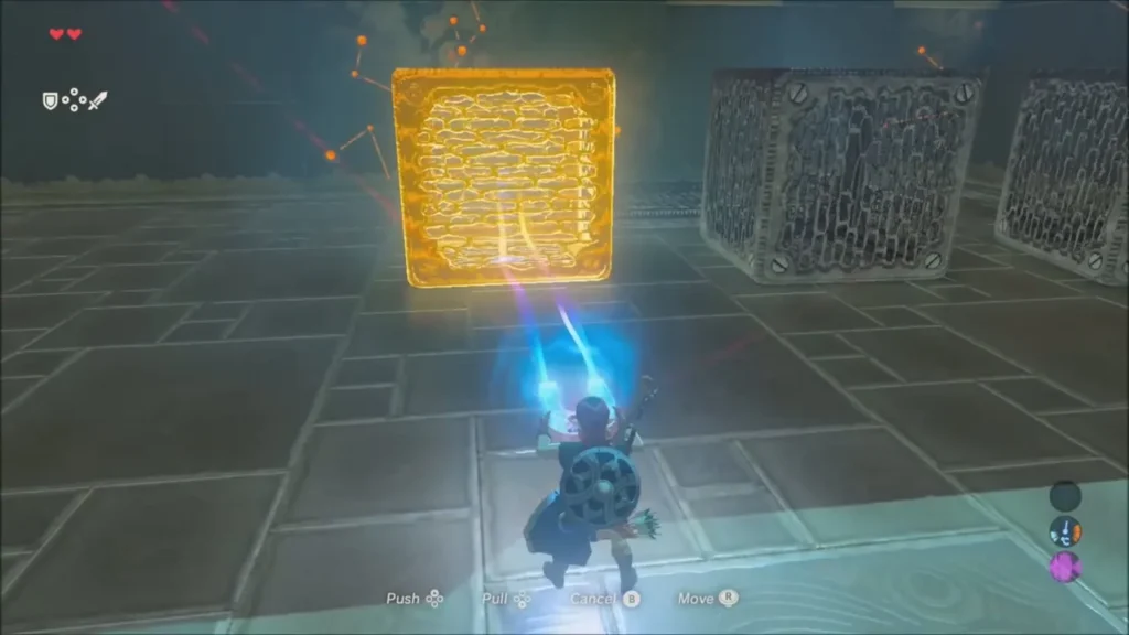 Link using Magnesis on a metal crate in Wahgo Katta Shrine Link using Magnesis on a metal crate in Wahgo Katta Shrine