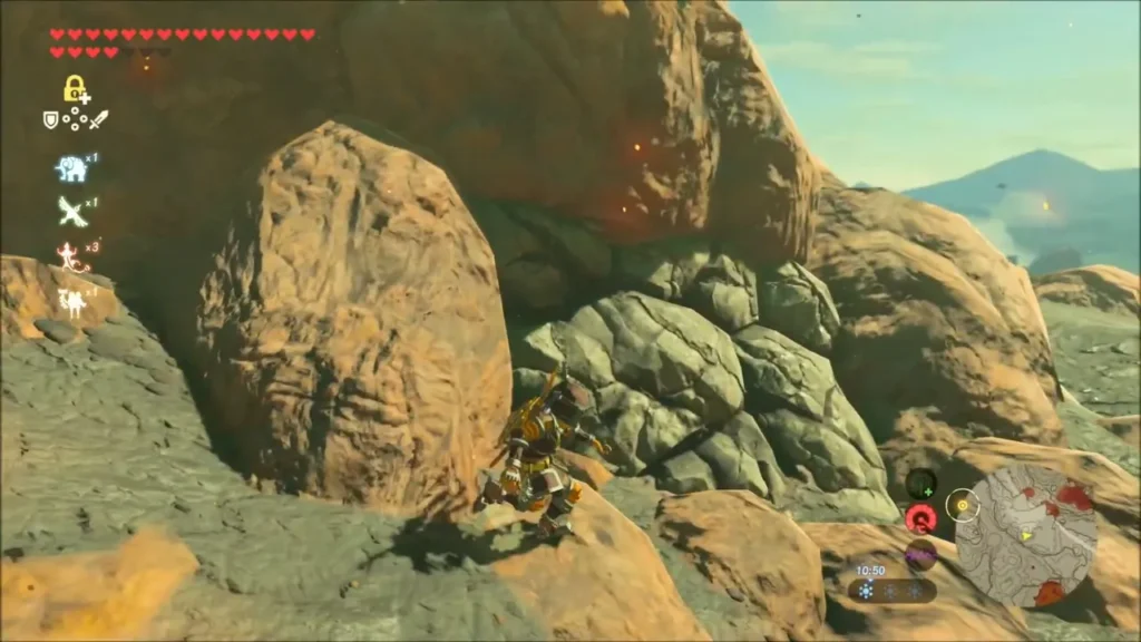 Link crouching beside a cracked rock wall on the slope Link crouching beside a cracked rock wall on the slope