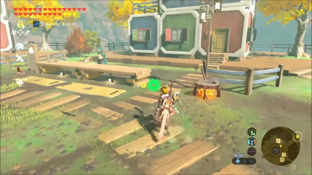 Link walking past lumber planks and a campfire in Tarrey Town Link walking past lumber planks and a campfire in Tarrey Town