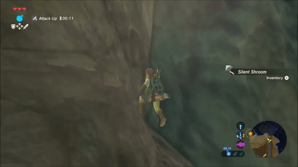 Link climbing a cliff wall and picking up a Silent Shroom Link climbing a cliff wall and picking up a Silent Shroom