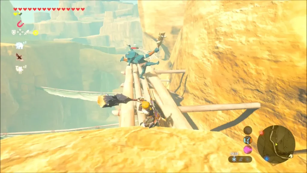 Link fighting a Bokoblin on a narrow log walkway above the canyon Link fighting a Bokoblin on a narrow log walkway above the canyon