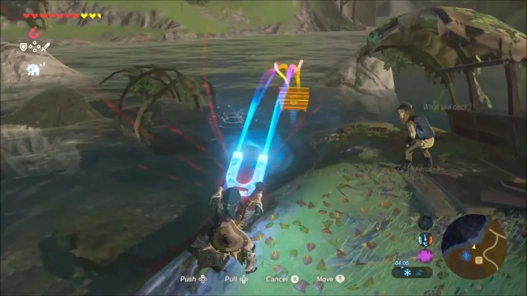 Link using Magnesis to lift a chest out of the river Link using Magnesis to lift a chest out of the river