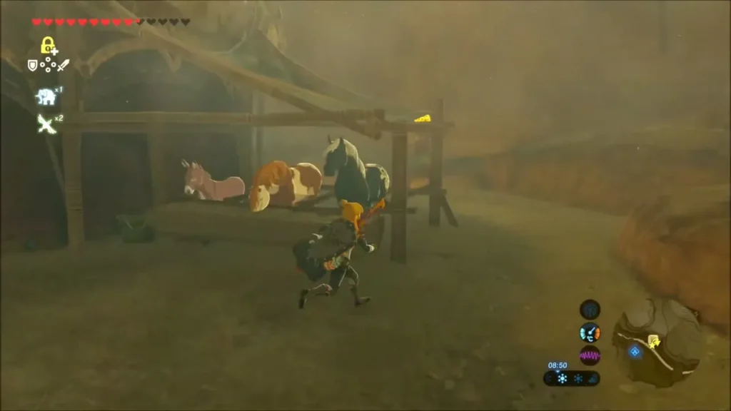 Link running past the stable horses toward the back of the stable Link running past the stable horses toward the back of the stable