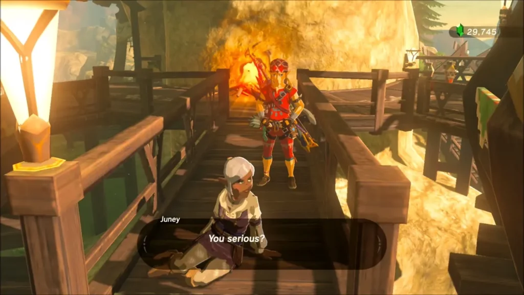 Link standing over Juney as she reacts to the baked apple