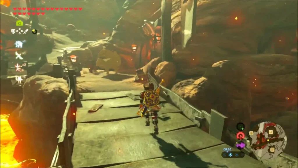 Link in Flamebreaker armor crossing a bridge over lava in Goron City Link in Flamebreaker armor crossing a bridge over lava in Goron City