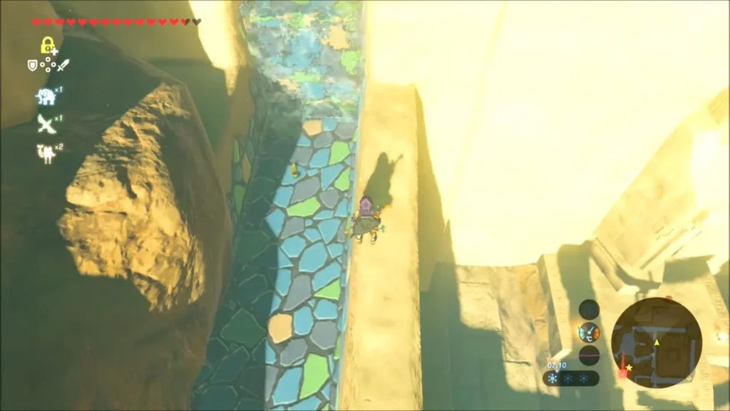 Link walking along the wall next to the tiled channel Link walking along the wall next to the tiled channel