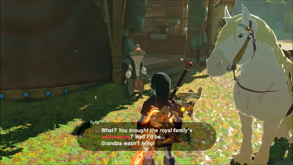 Toffa amazed at the white royal horse standing next to Link Toffa amazed at the white royal horse standing next to Link