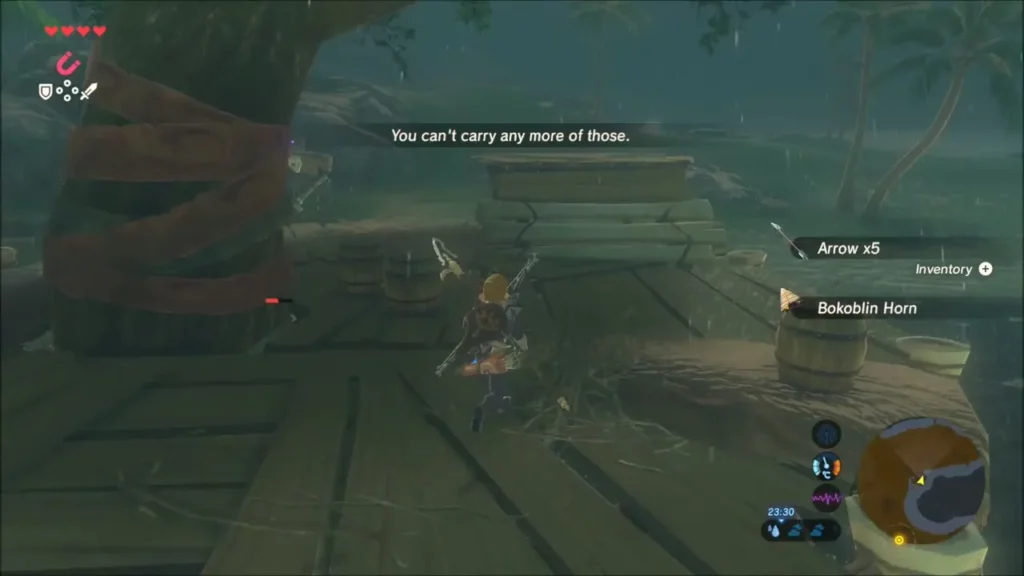 Link on the camp's wooden platform picking up Bokoblin drops Link on the camp's wooden platform picking up Bokoblin drops