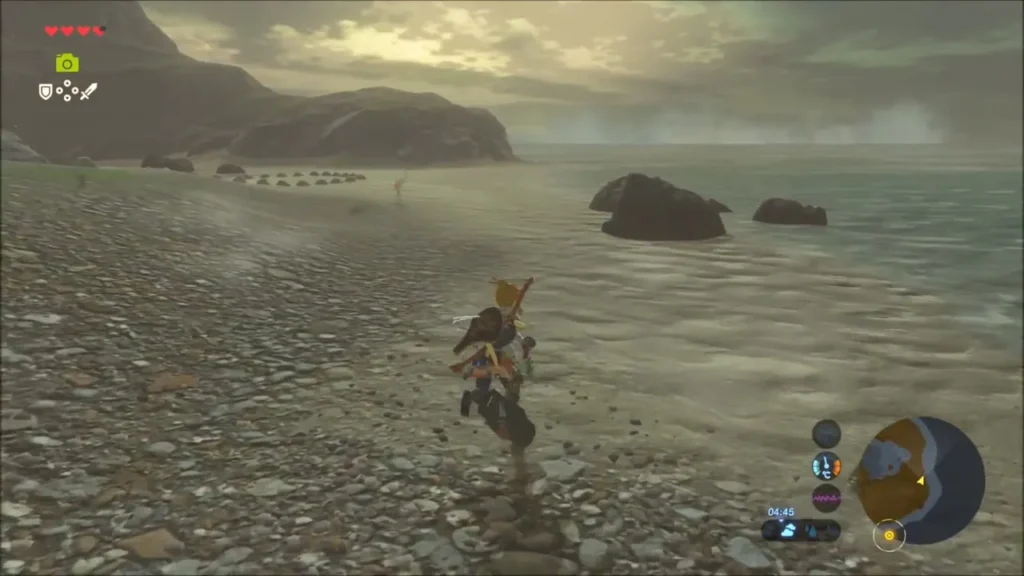 Link running along the pebbly shore of Hateno Beach Link running along the pebbly shore of Hateno Beach