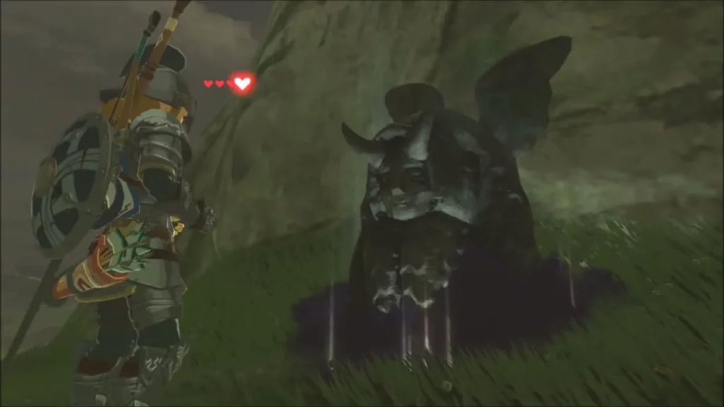 A heart appearing beside Link as the statue returns a container A heart appearing beside Link as the statue returns a container