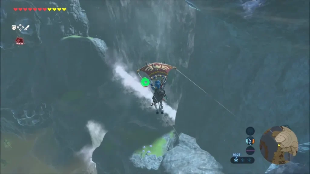 Link gliding down the cliff past a waterfall Link gliding down the cliff past a waterfall