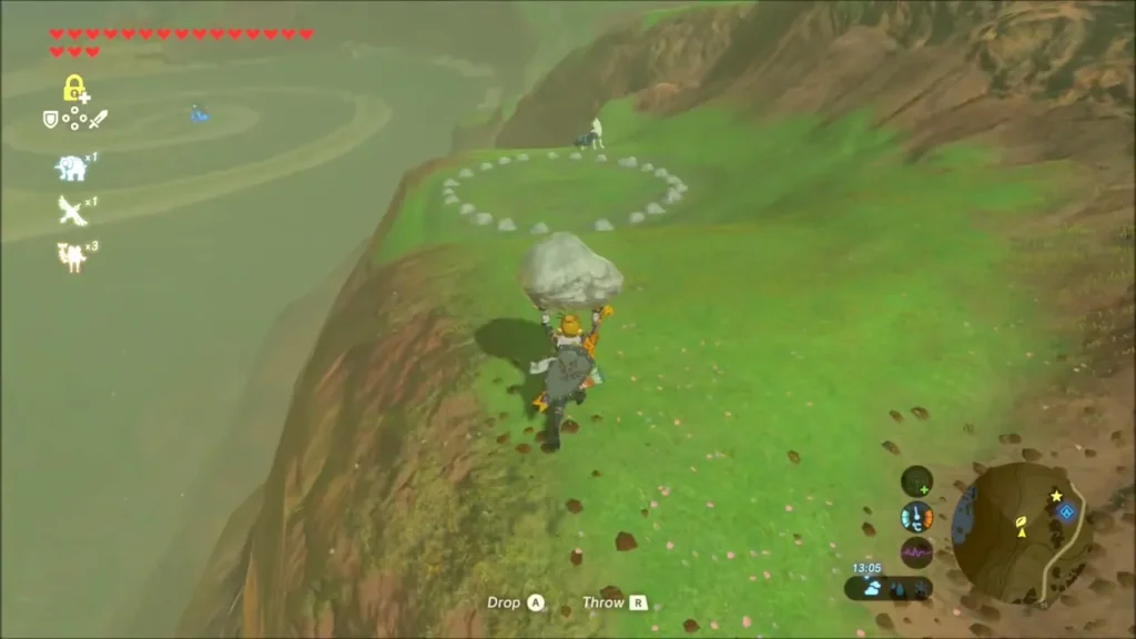 Link carrying a boulder along the slope toward the stone ring Link carrying a boulder along the slope toward the stone ring