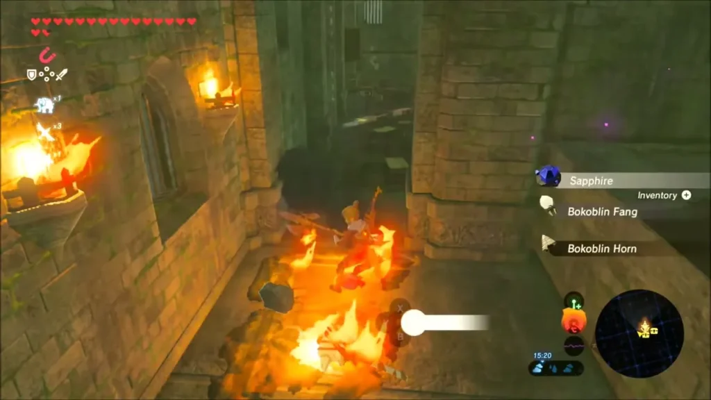 Link striking Bokoblins around a burning camp fire in the citadel Link striking Bokoblins around a burning camp fire in the citadel