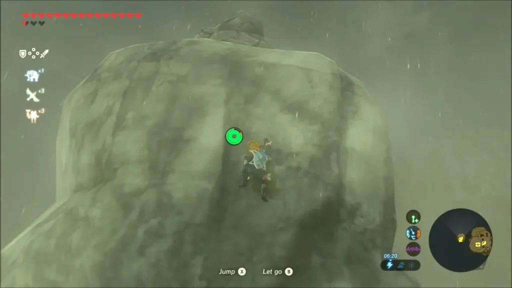Link climbing a steep boulder face on Tingel Island in the rain Link climbing a steep boulder face on Tingel Island in the rain