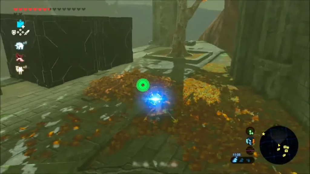 A Remote Bomb on a leaf pile beneath a tree by dark stone walls A Remote Bomb on a leaf pile beneath a tree by dark stone walls