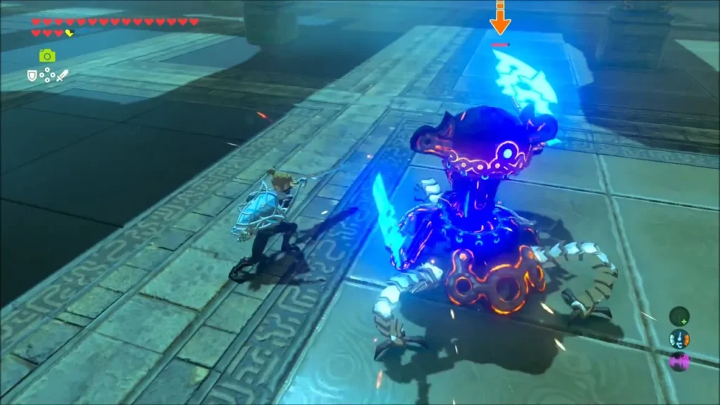 Link fighting a Guardian Scout in the shrine chamber Link fighting a Guardian Scout in the shrine chamber