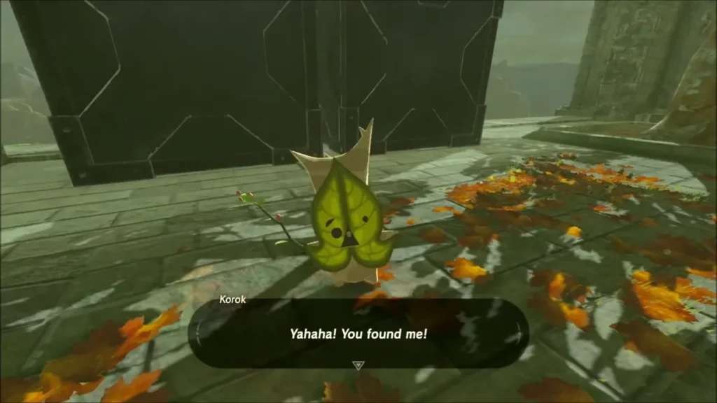 A Korok saying it was found beside dark stone walls and scattered leaves A Korok saying it was found beside dark stone walls and scattered leaves
