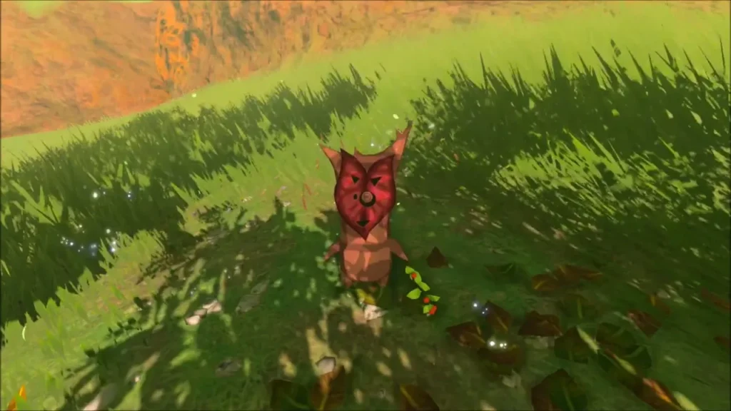 A Korok standing in sunlit grass among fallen leaves A Korok standing in sunlit grass among fallen leaves