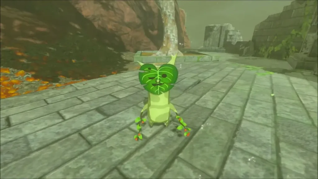 A Korok standing on the paved terrace after the leaves blew away A Korok standing on the paved terrace after the leaves blew away