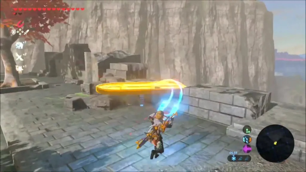 Link freezing a loose stone slab with Stasis on a ruined cliff-edge terrace Link freezing a loose stone slab with Stasis on a ruined cliff-edge terrace
