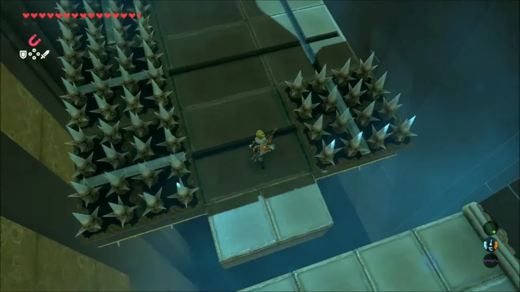 A tilting platform crossing a bridge lined with spikes A tilting platform crossing a bridge lined with spikes
